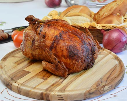 Frango assado com recheio e farofa em Rio Preto Casa de Carnes Espanha